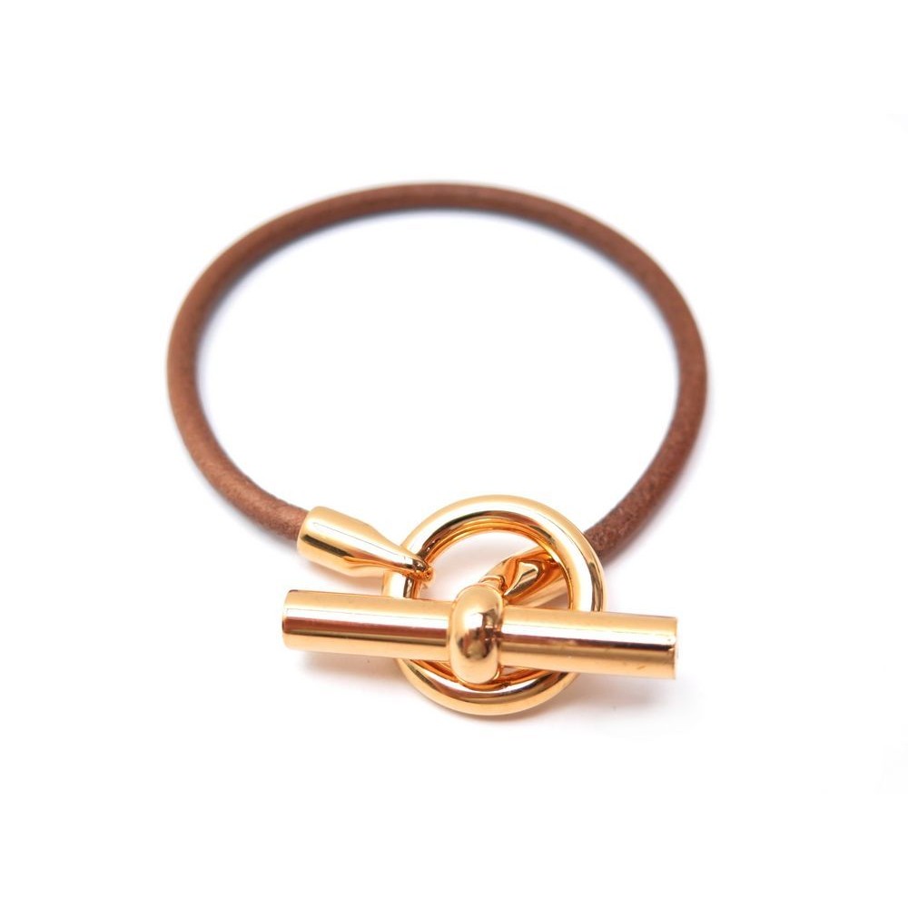 bracelet hermes glenan 18 cm en metal dore cordon