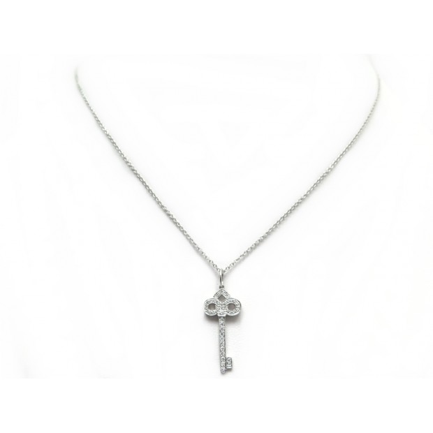 PENDENTIF TIFFANY AND CO CLE FLEUR DE LYS PLATINE 950 ET DIAMANTS 