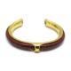 BRACELET HERMES METAL DORE ET CUIR CROCODILE MARRON 