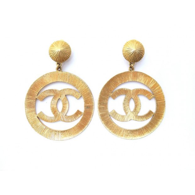 BOUCLES D OREILLE CHANEL METAL DORE 