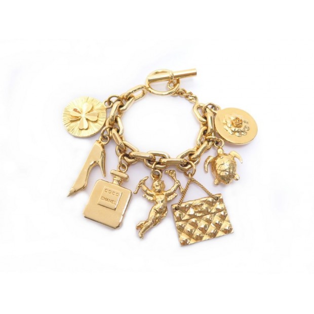 BRACELET CHANEL A BRELOQUES TREFLE SAC TIMELESS TORTUE CHARMS CAMELIA METAL DORE 