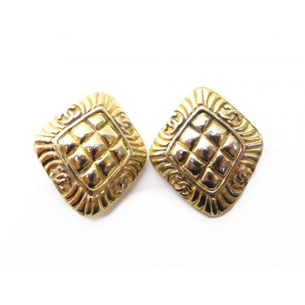 BOUCLES D OREILLES CHANEL METAL DORE 