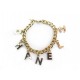 BRACELET CHANEL CHAINE BRELOQUES LETTRES 19 CM EN METAL DORE GOLDEN CHARMS 890€