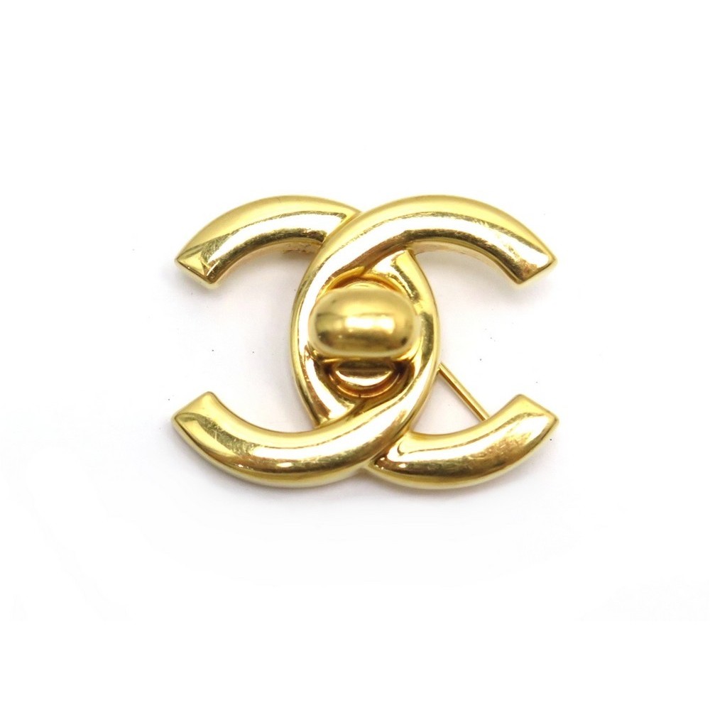 broche chanel logo cc fermoir timeless en metal dore