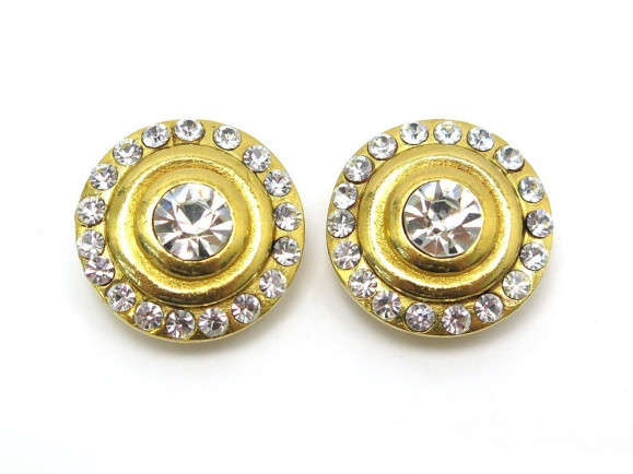 boucles d'oreilles chanel rondes en metal dore