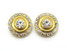 boucles d'oreilles chanel rondes en metal dore