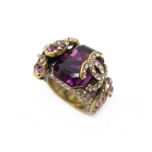 BAGUE CHANEL FLEUR ET LOGO CC STRASS VIOLET 53 EN METAL DORE + BOITE RING 650€