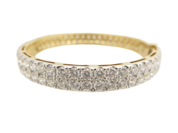 bracelet en or jaune 18k serti de 100 diamants 16 cts