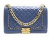sac a main chanel grand boy en cuir cuir matelasse