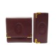 LOT PORTE MONNAIE + PORTE CLE MUST DE CARTIER MULTICLE EN CUIR BORDEAUX 640€