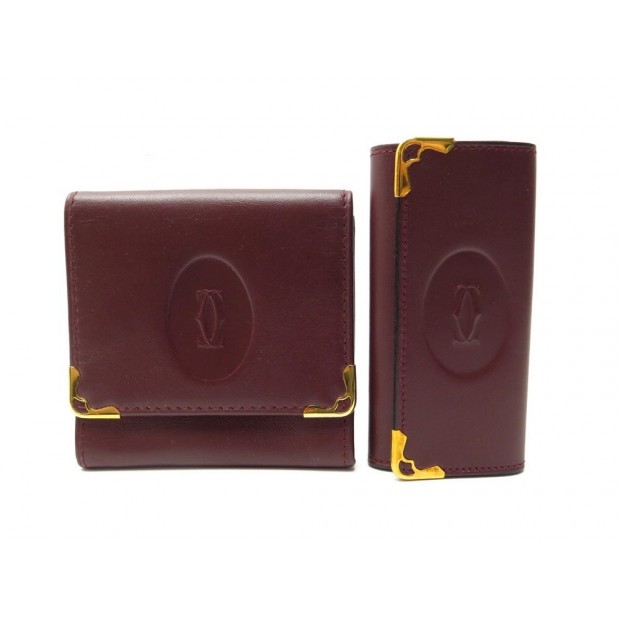 LOT PORTE MONNAIE + PORTE CLE MUST DE CARTIER MULTICLE EN CUIR BORDEAUX 640€