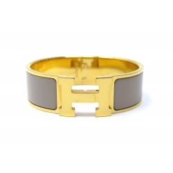 BRACELET HERMES CLIC CLAC H H300001F19GM T19 EN EMAIL TAUPE ET PLAQUE OR 635€