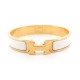 BRACELET HERMES CLIC H H700001F01 T17 EN EMAIL BLANC ET PLAQUE OR + BOITE 595€