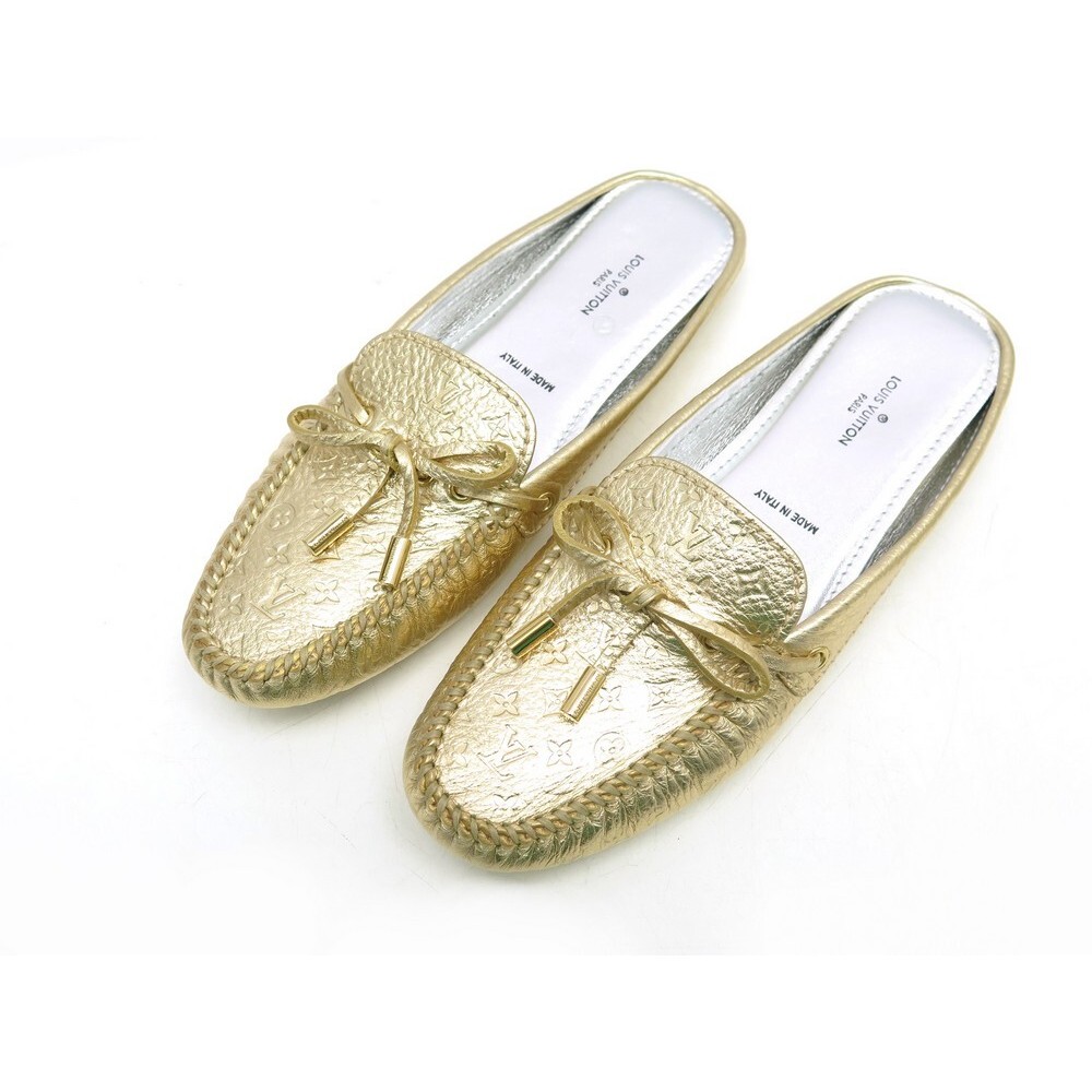 A Pair Of Louis Vuitton Lady's Gloria Loafers