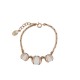 BRACELET CHRISTIAN DIOR TRIBALE 16 A 19 CM EN METAL DORE ET PERLES BLANCHES 450€