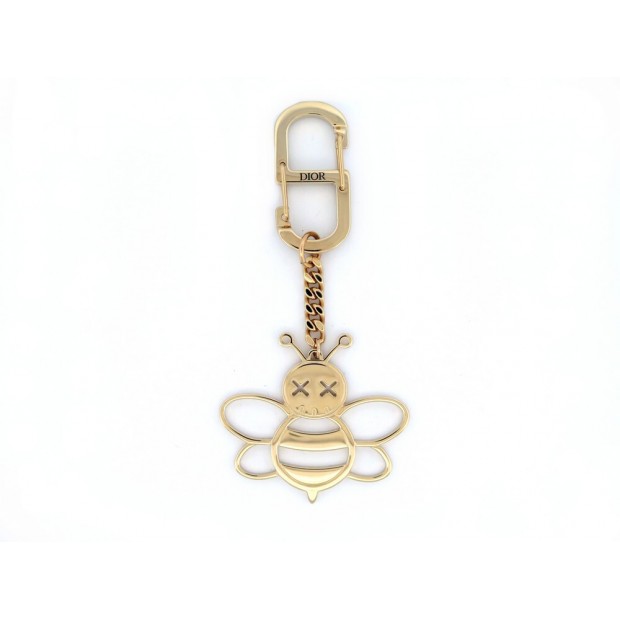 NEUF PORTE CLES CHRISTIAN DIOR X KAWS BEE METAL DORE ABEILLE SAC KEY RING 550€