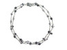 collier chanel sautoir perles noires et blanches logo