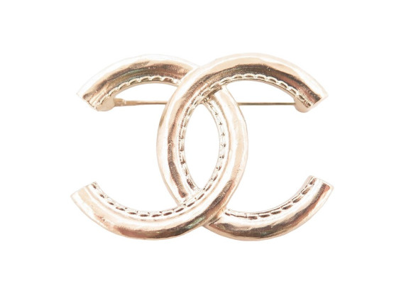 broche chanel logo cc en metal dore collection