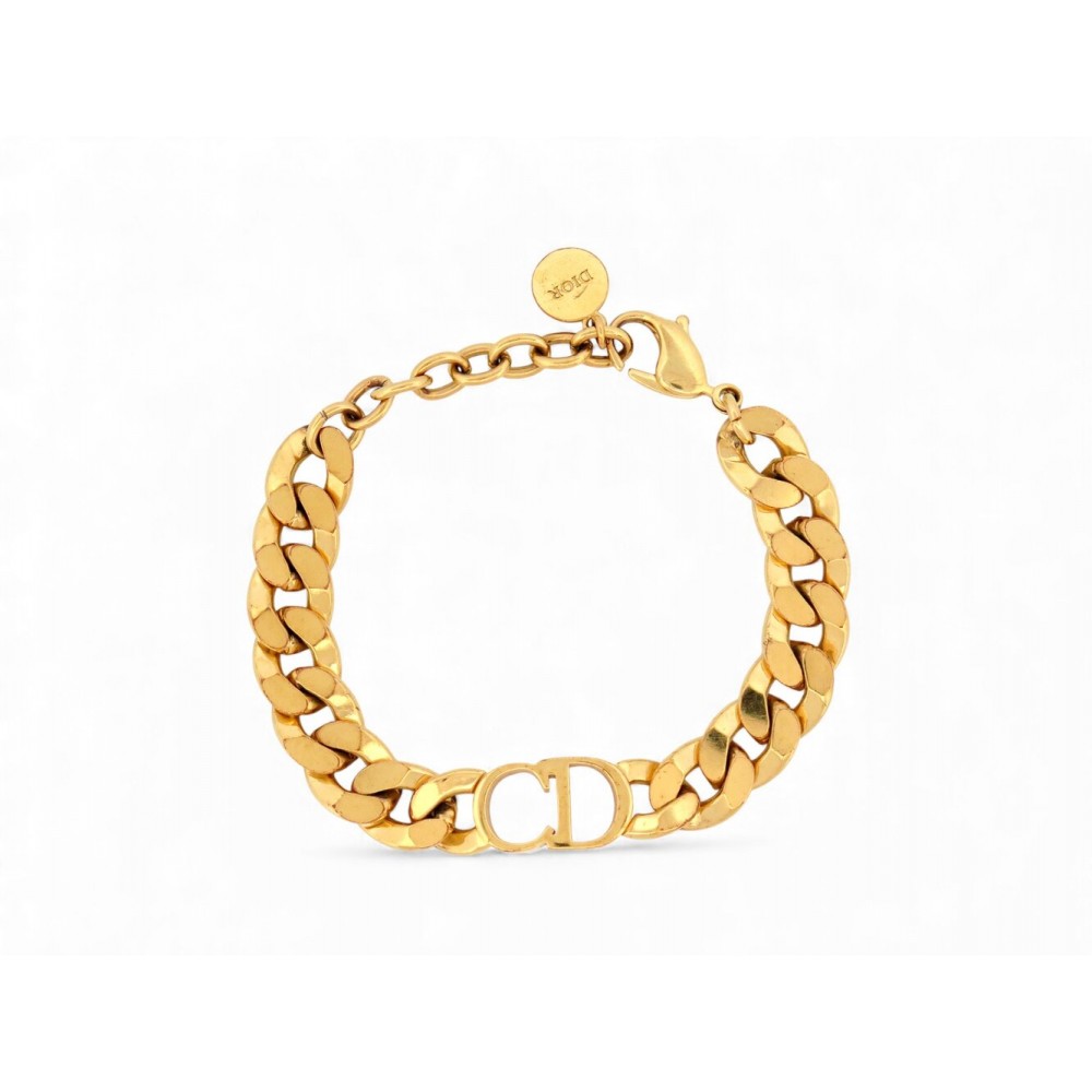 BRACELET CHRISTIAN DIOR GOURMETTE CD DANSEUSE ETOILE DORE + POCHON BANGLE 460€