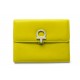 SAC POCHETTE A MAIN SALVATORE FERRAGAMO GANCINI EN CUIR JAUNE BOITE CLUTCH 890€