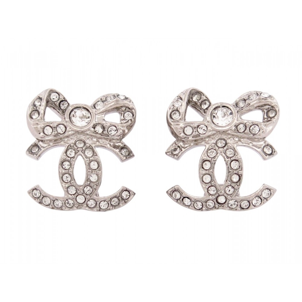 NEUF BOUCLES D'OREILLES CHANEL LOGO CC NOEUD ET STRASS METAL STEEL EARRINGS 650€