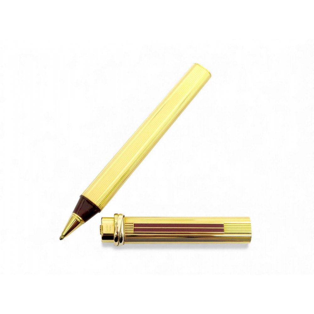 STYLO BILLE MUST DE CARTIER GODRON ST10321 TRINITY EN PLAQUE OR ROLLER PEN 780€