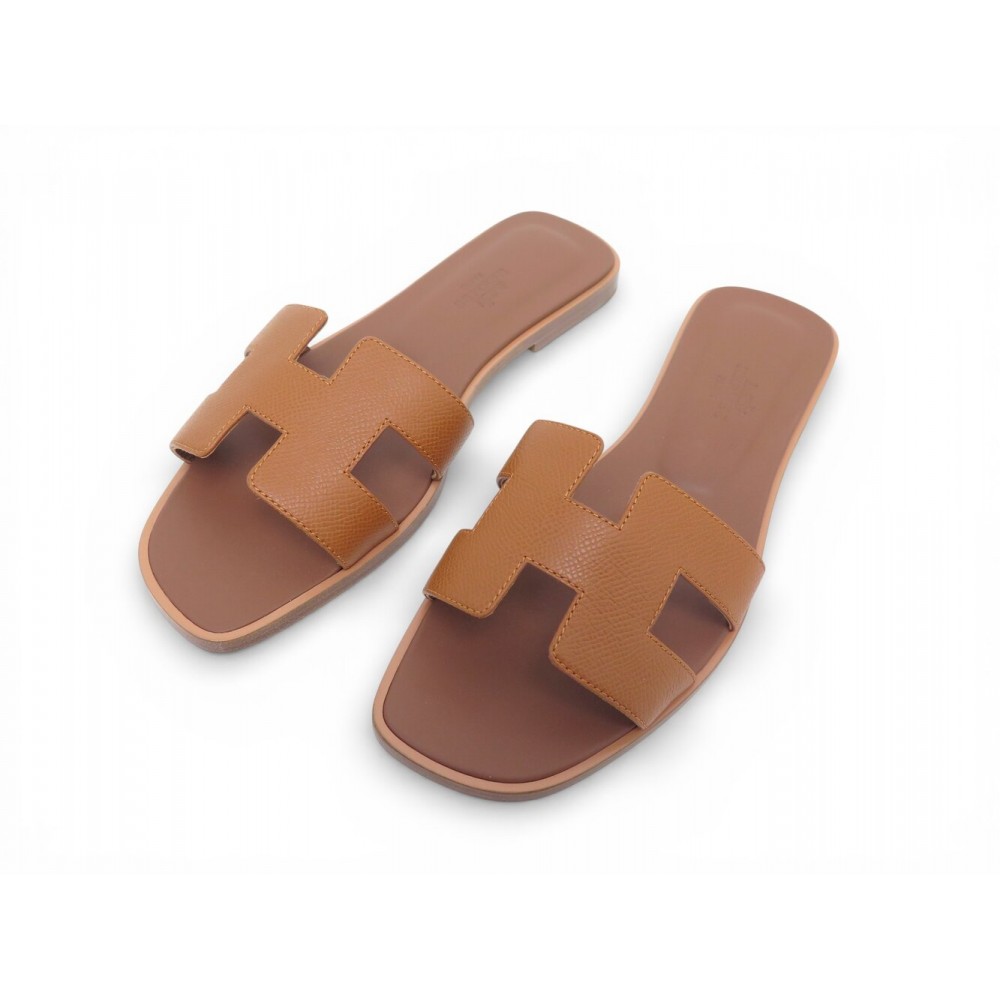 NEUF CHAUSSURES HERMES ORAN H222099Z T37 EN CUIR EPSOM GOLD MULES SANDALES 635€