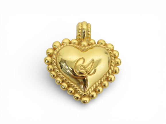 broche christian lacroix coeur logo en
