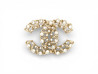  broche chanel logo cc ajoure strass en metal dore