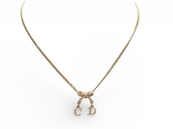 collier christian dior pendentif noeud strass