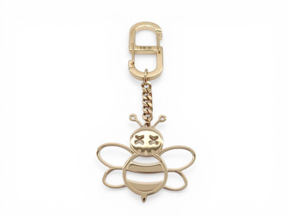  porte cle christian dior x kaws bee dore abeille