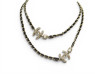 collier chanel sautoir logo cc strass metal dore cuir