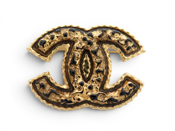  broche chanel logo cc dore stylisee en relief