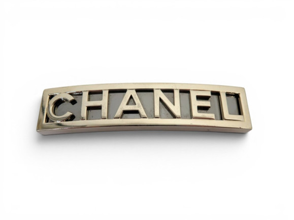 accessoire de cheveux chanel barette logo metal dore