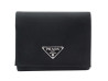 petit portefeuille prada logo en toile re nylon porte