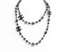 collier chanel sautoir logo cc camelia perles