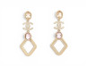 boucles d'oreilles chanel pendantes logo cc perles