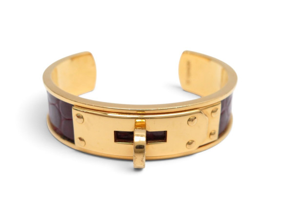 bracelet hermes jonc ouvert kelly plaque or cuir de
