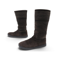 bottes chanel fourrees logo cc en cuir mouton retourne