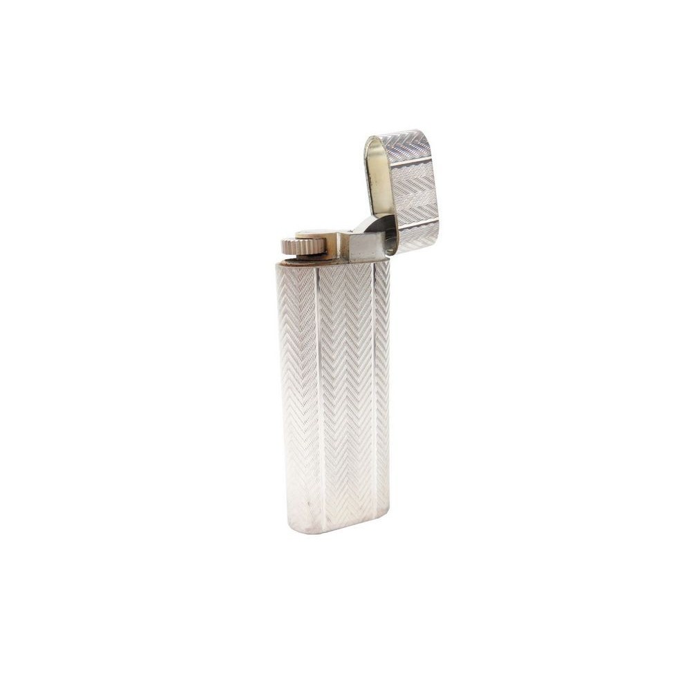 briquet cartier ovale en metal argente 