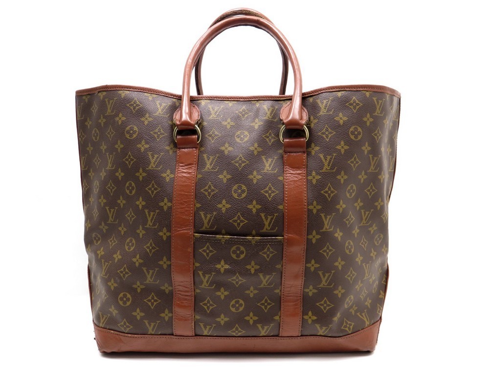 sac voyage louis Vuitton assez grand et presque neuf