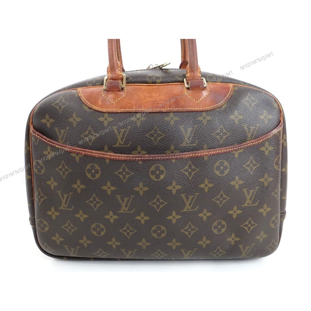 Lot - Louis Vuitton Monogram Horizon 50 rolling luggage suitcase: 19 1/2H  x 14 1/2W x 8D