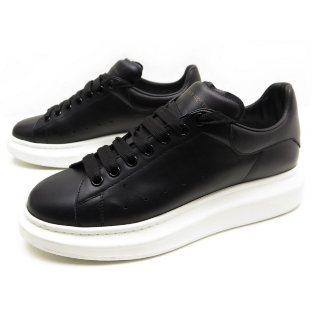 ALEXANDER MCQUEEN Oversized black leather sneakers | Harvey Nichols